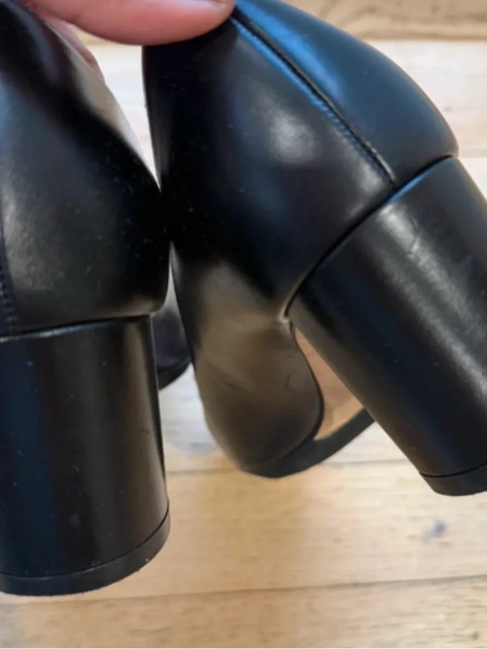 Stuart Weitzman Black Leather Pumps with Gold Buckle Accent